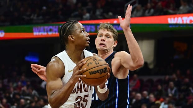 Oct 12, 2023; Cleveland, Ohio, USA; Cleveland Cavaliers forward Isaac Okoro (35) drives to the basket against Orlando Magic center Moritz Wagner (21) during the second half at Rocket Mortgage FieldHouse.